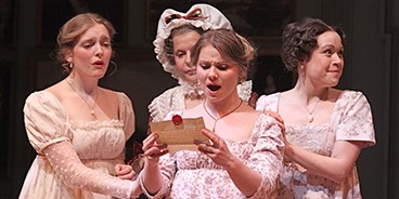 The Bennett Family opening a letter