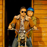 Asian couple on a motorcycle