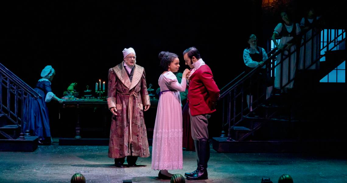 Andrew May (Ebenezer Scrooge), Angelique Archer (Belle), Alex Purcell (Young Scrooge) and the cast of A Christmas Carol at Cincinnati Playhouse in the Park. Photo by Mikki Schaffner.