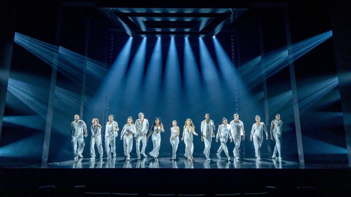Gods on stage in white lights